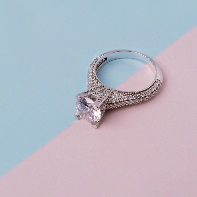 Side Stone Solitaire Ring